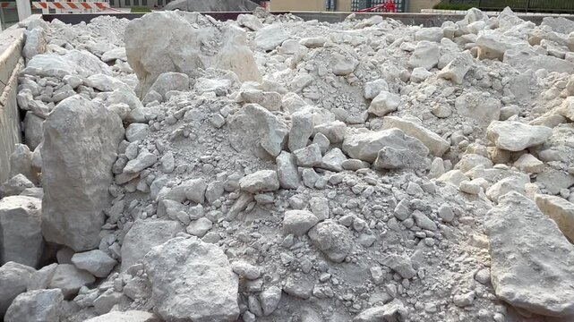 Crushed rock in a dumpster