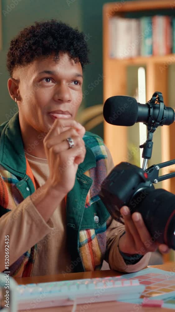 Aufkleber camera, review and live streaming with man in studio for photography specs, lens guide or shooting t