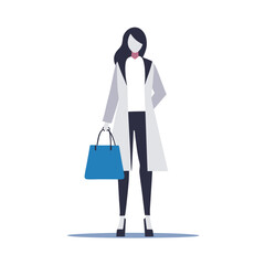 a woman in a trendy outfit carrying a designer shopping bag