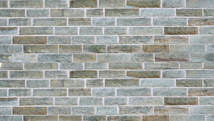 Grey stone brick wall texture background