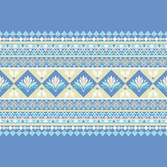 Seamless traditional Thai textile pattern with lotus flower motifs in diamond shapes, arranged in horizontal bands. This light blue and cream-toned design features pastel elements and  borders.