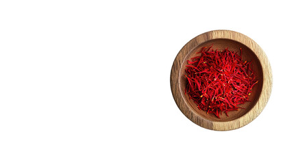saffron thread in the wooden plate, isolated on the white background.
