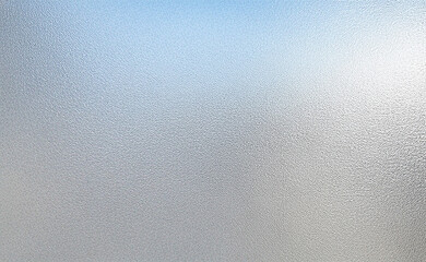 Frosted glass texture with a white translucent appearance and diffused light effect. Abstract,...