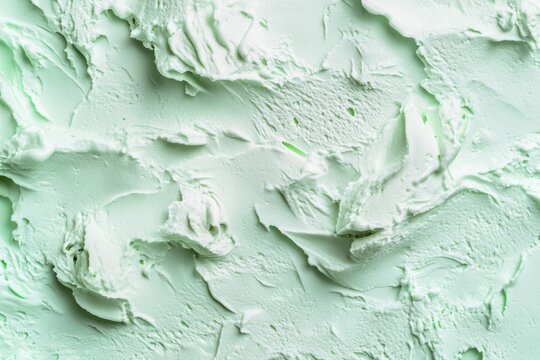 Close-up view of textured mint green ice cream.