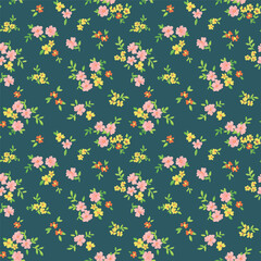	
Seamless ditsy floral pattern. Cute garden flowers and leaves colorful pattern. 