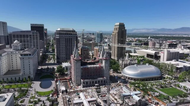 Aerial Salt Lake City Utah LDS Temple Square 1 pull. City center downtown business and religious headquarters. The Church of Jesus Christ of Latter-day Saints temple square. Capitol city urban.