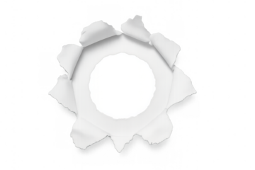 White sheet of paper featuring torn edges, creating a striking transparent hole effect that enhances empty space and adds depth
