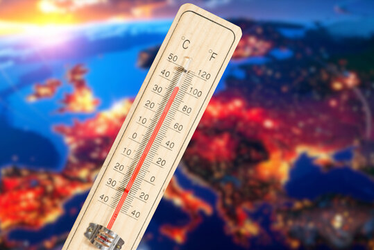Thermometer and map of Europe in reddish colors symbolize climate change and a heat wave