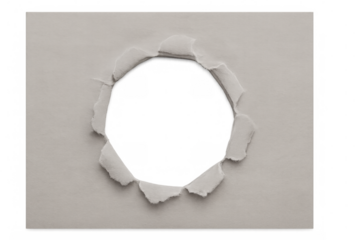 Jagged paper edges forming circular cutout revealing white background, transparent overlay for graphic design projects