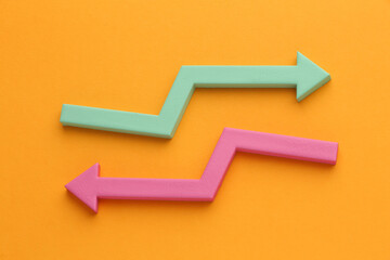 Multicoloured arrows pointing up and down. Symbolise growth progress, success in business finance. Rising bars of graphs represent market trends, return on investment, business development, financial