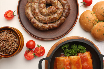 Ukrainian golubtsi are cabbage rolls stuffed with ground meat and rice, cooked in tomato-based...