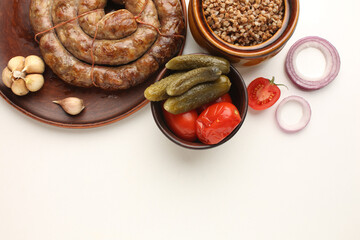Traditional food of Ukraine is homemade sausage and buckwheat porridge.