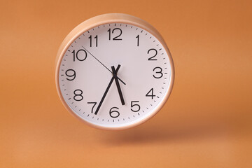 Close-up of a wall clock. The concept of time and work time is valuable for life, Alarm clock...