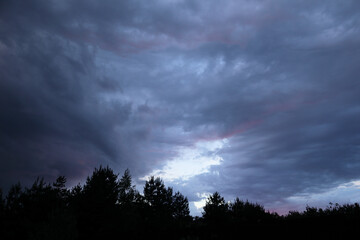 Fototapeta premium Beautiful colorful stormy sky at sunset. Sunset with mood stormy sky