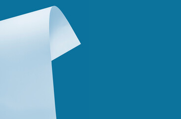 A sheet of paper on a blue background with space for text.