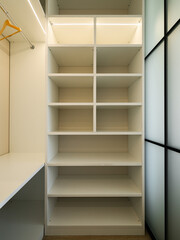 A Beautiful Modern Minimalist Shelving Unit Displayed in an Open and Bright Room Space