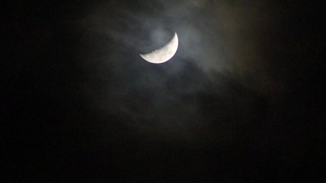half moon and clouds at night