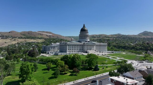 Aerial Utah State Capitol Building summer 1 slide. City center downtown business and religious headquarters. The Church of Jesus Christ of Latter-day Saints temple square. Capitol city urban.