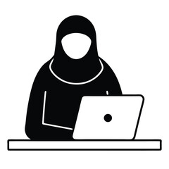 an arab woman uses her laptop computer for work or study