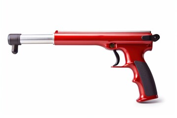 Red tool designed for stress relief used during a creative workshop in a studio environment