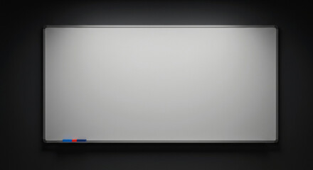 Empty modern whiteboard mounted on a dark wall. Blank surface ready for use in a professional office setting. Modern office equipment.
