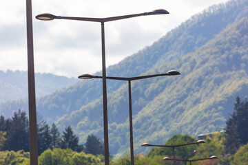A series of street lights are lined up on a mountain