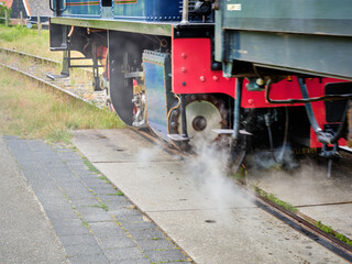 Motion of Steam locomotive La Meuse No. 5 'Enkhuizen' departs from Hoedekenskerke station