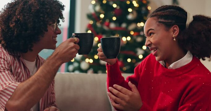 Smile, couple and talk with drink on Christmas for holiday tradition, comfort and festive season. Happy, people and cheers with beverage, eggnog and bonding together for weekend celebration at house