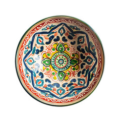 Top View Of A Colorful Ceramic Bowl With An Intricate Floral Pattern Against White Background. Handmade Craftwork For Home Decor.