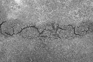 Textured Concrete Surface with Dried Residue, Moss Crust, and Fine Cracks