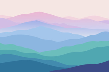 Misty blue mountain landscape at sunrise with a panoramic view of peaks and valleys