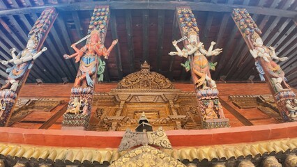 Obraz premium Elaborate Artwork and Sculpted Deities on a Historic Nepalese Temple Jaya Bageswari , Kathmandu 