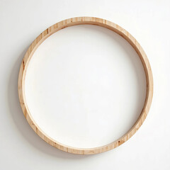 Obraz premium Round wooden frame made of natural wood on plain wall background