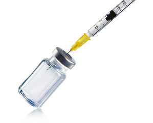 Medical syringe and a bollte with vaccine.