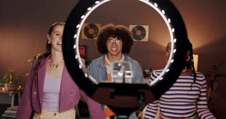 Happy, ring light and friends dance in bedroom for social media, recording and post on internet. Influencer, content creator and people with energy for performance, viral video and online tutorial