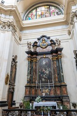 An altar of the side chapel in the Church of  San Bernardino alle Ossa, Milan
