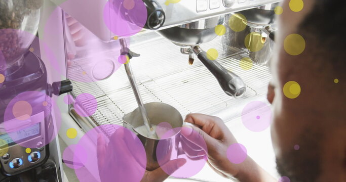Image of falling purple dots over barista making coffee
