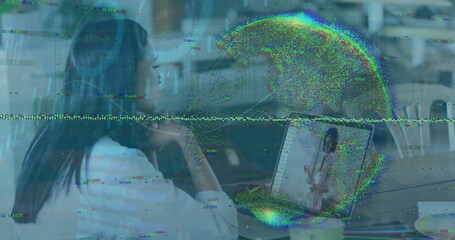 Image of data processing and globe over businesswoman using laptop