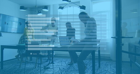 Image of graphs over diverse female and male coworkers in office