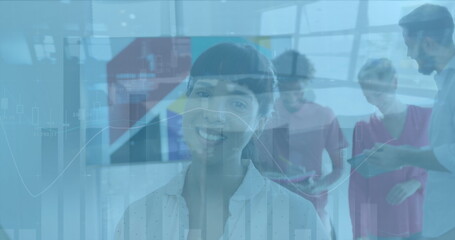 Image of financial data processing over diverse business people in office