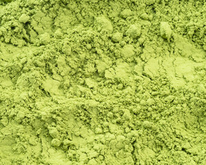 Matcha tea, finely ground powder of green tea  close up.