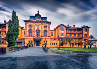 Rainy autumn view of beautiful building in Bardejov town, Slovakia, Europe. Gloomy morning scene of Slovak resort. Traveling concept background.
