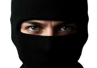 Isolated Intense Eyes Peeking Out from Balaclava