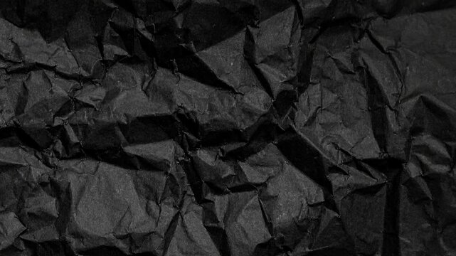 crumpled black paper