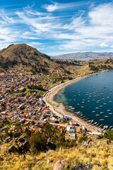 Vertical cityscape of Copacabana city by Titicaca Lake, Bolivia.