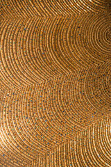 Golden rough expensive surface made of expensive natural materials