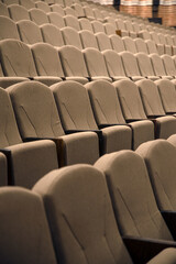 Obraz premium Grey and beige chairs in the theater hall