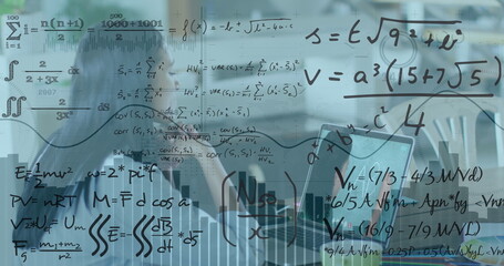Image of mathematical equations over businesswoman using laptop