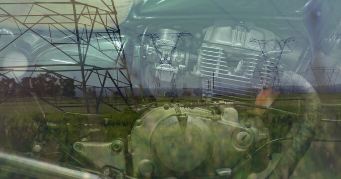 Fototapeta Image of electricity poles over car engine