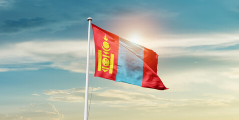 Mongolia national flag waving in beautiful sky with mast. A proud moment flag waving with sunlight.